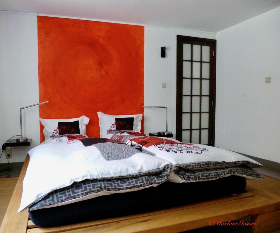 Voodi või voodid majutusasutuse Duplex Zen toas