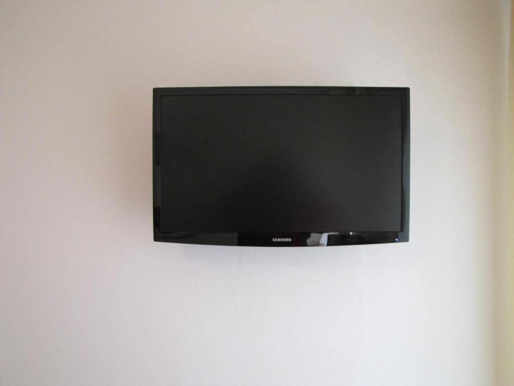 TV a/nebo společenská místnost v ubytování Hotel Scaranò
