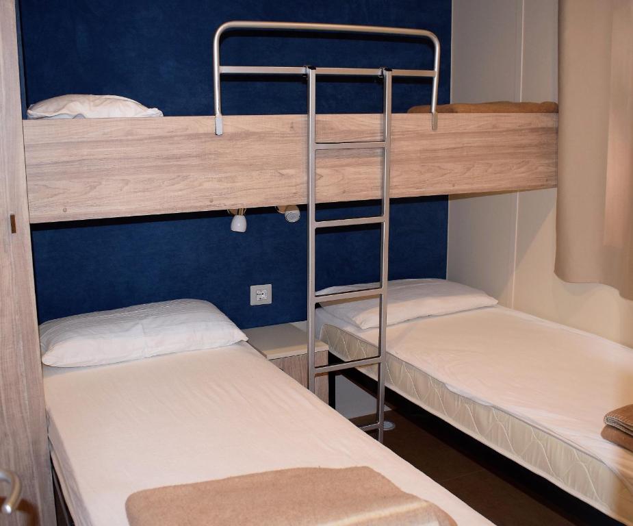 Postel nebo postele na pokoji v ubytování Camping Free Beach