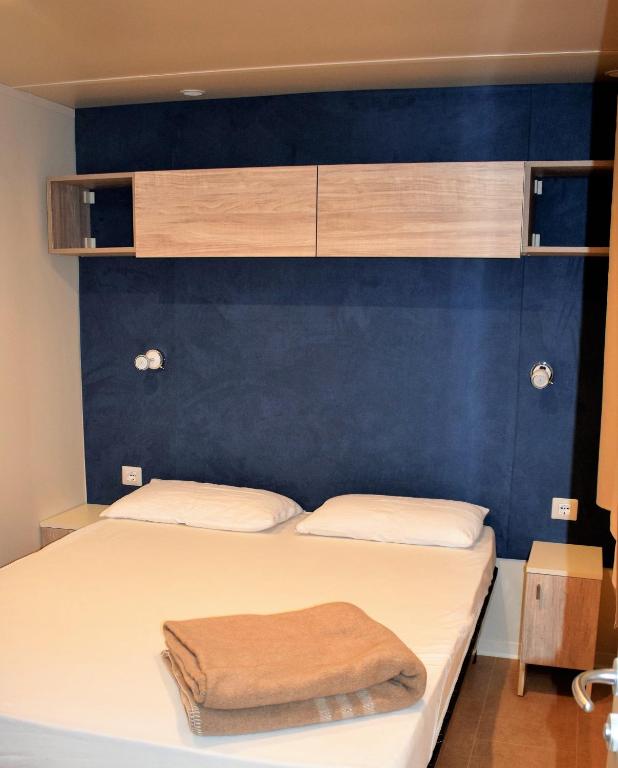 Postel nebo postele na pokoji v ubytování Camping Free Beach