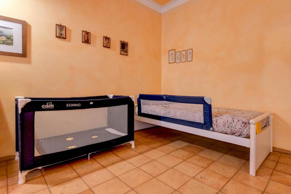 Posteľ alebo postele v izbe v ubytovaní Colleincanto Appartamento Torretta