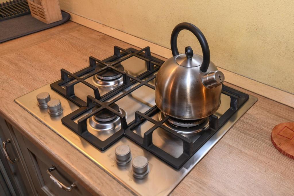 Príslušenstvo na prípravu kávy alebo čaju v ubytovaní Colleincanto Appartamento Torretta