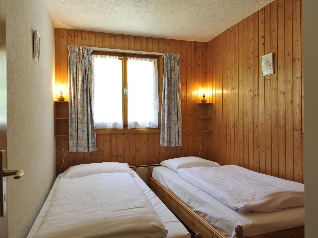Postel nebo postele na pokoji v ubytování Chalet Mountain View by Interhome