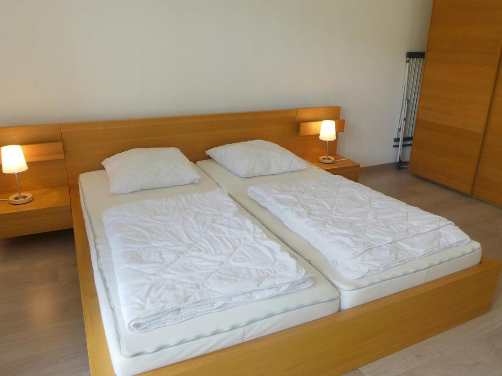 Postel nebo postele na pokoji v ubytování Apartment Andromède 2-pièces A24 by Interhome