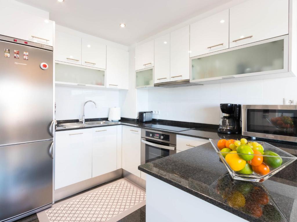 A kitchen or kitchenette at Apartment Club Nautic-22 by Interhome