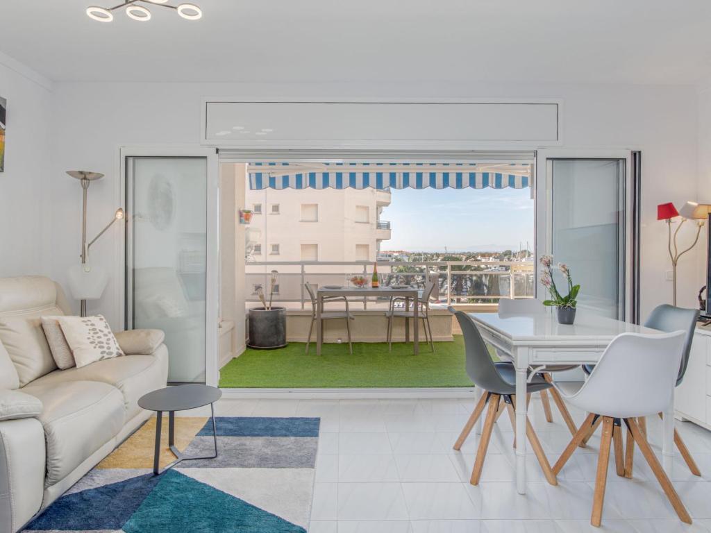 A seating area at Apartment Club Nautic-22 by Interhome