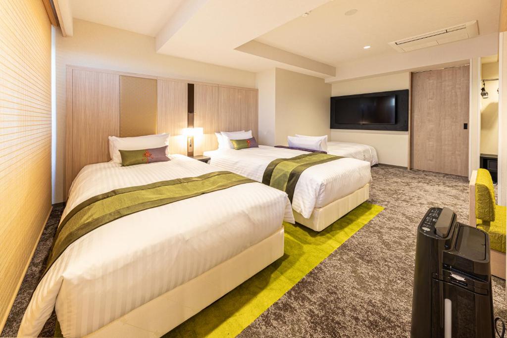 Postel nebo postele na pokoji v ubytování Hotel Musse Kyoto Shijo Kawaramachi Meitetsu