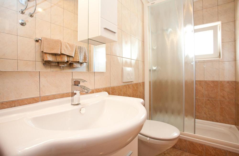 Łazienka w obiekcie Apartments Mato