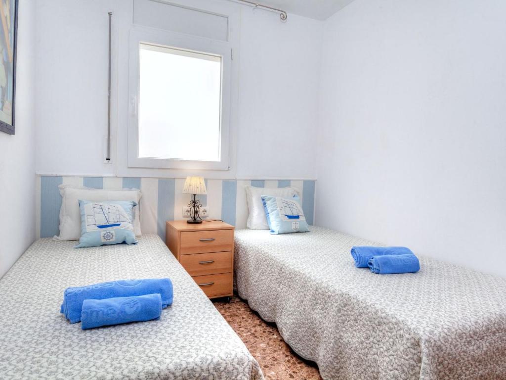 Posteľ alebo postele v izbe v ubytovaní Apartment Albatros by Interhome