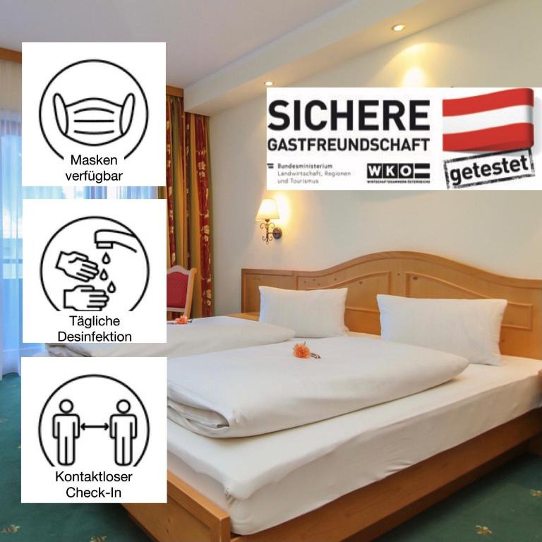 Postel nebo postele na pokoji v ubytování Hotel Tiroler Adler - bed and breakfast
