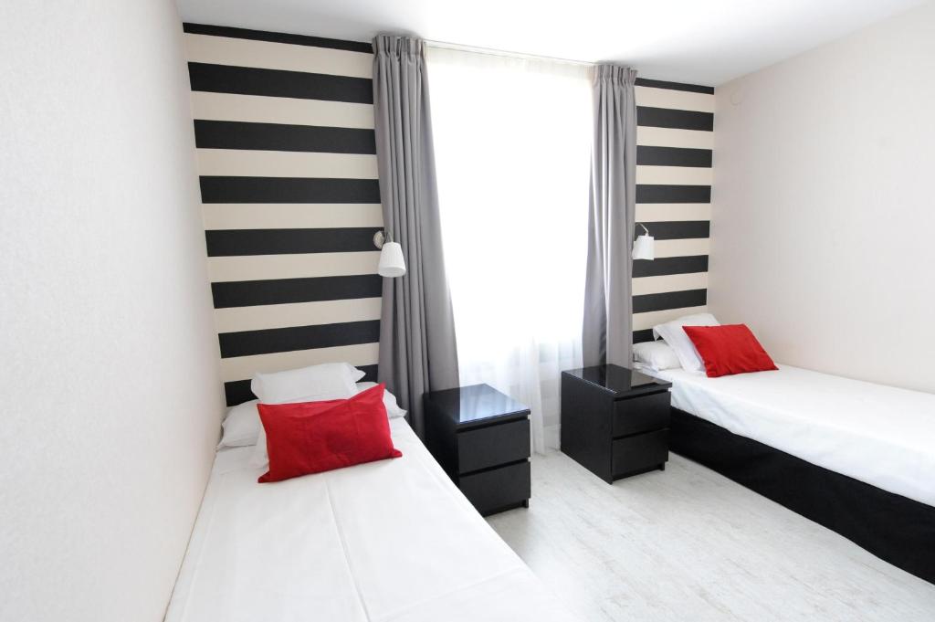 Posteľ alebo postele v izbe v ubytovaní Hotel Domus