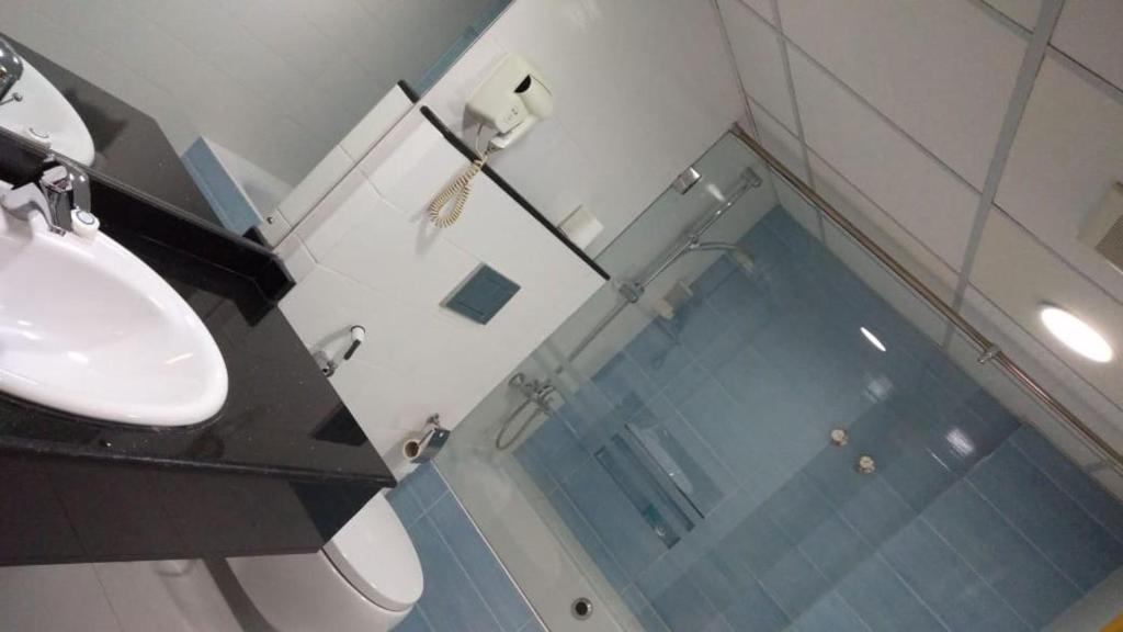 Koupelna v ubytování Al Reef Hotel