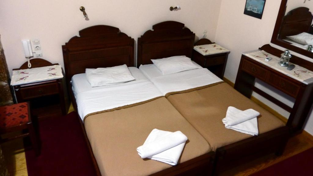 Postel nebo postele na pokoji v ubytování Akrotainaritis