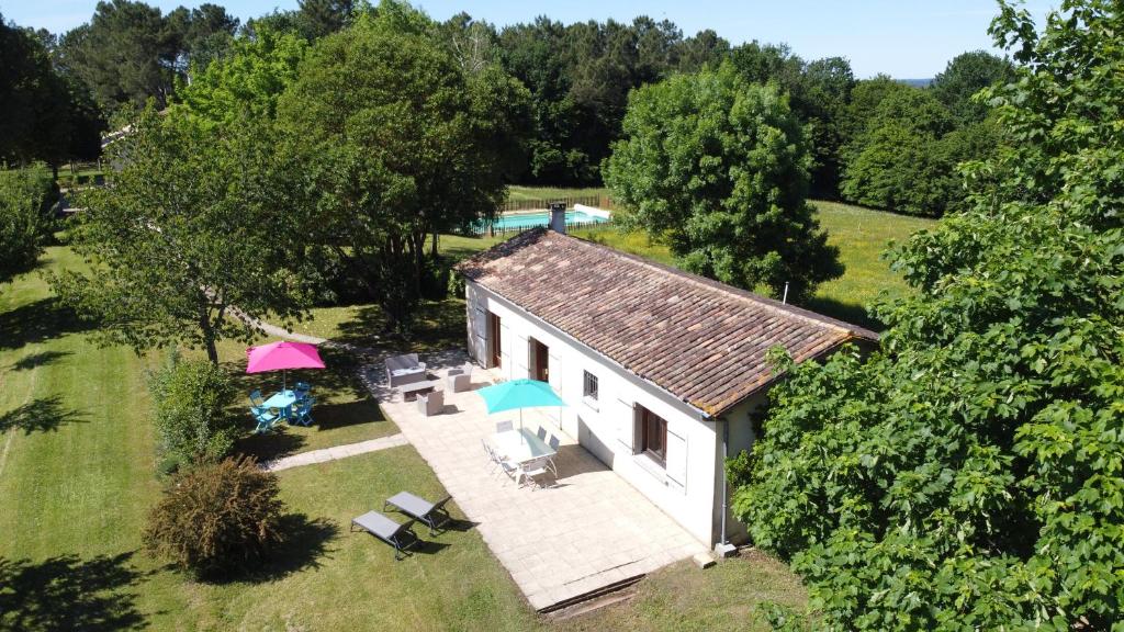 an aerial view of a house with a pool at DOMAINE SOLAYA in Coutras