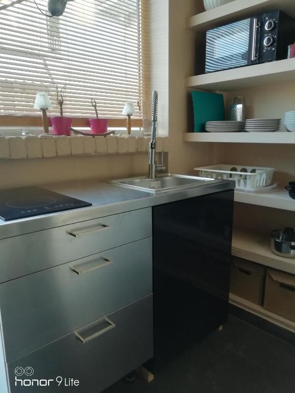 A kitchen or kitchenette at Myron Apartments
