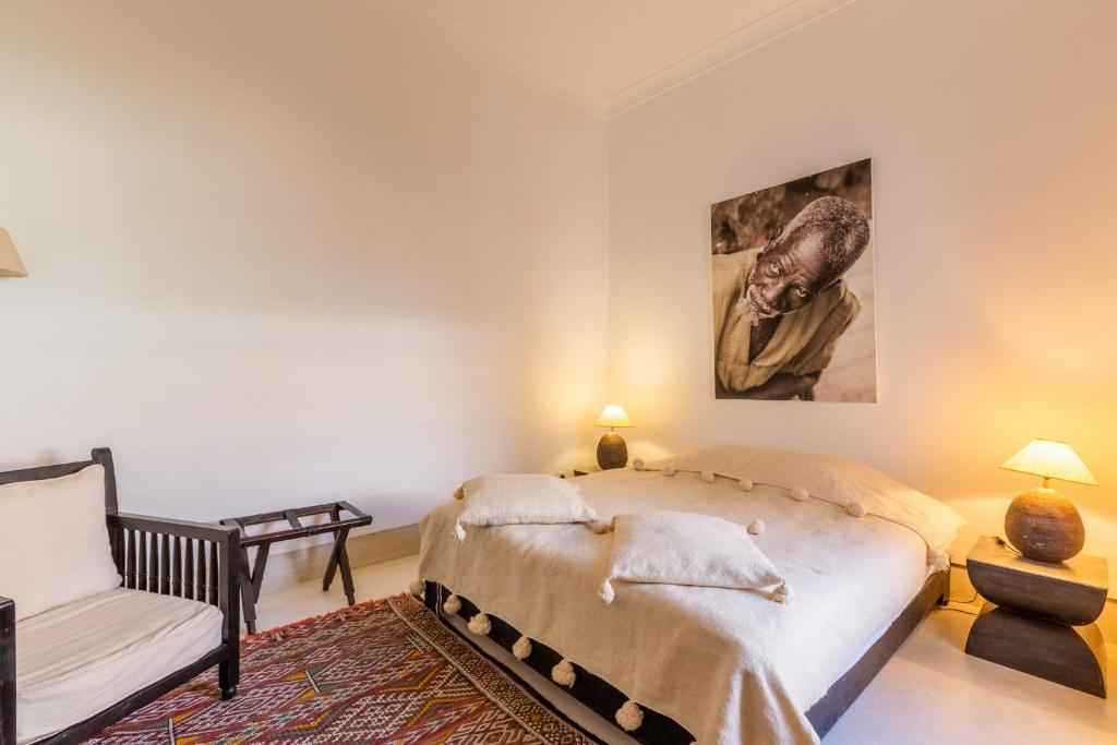 Postel nebo postele na pokoji v ubytování Riad Tchaikana