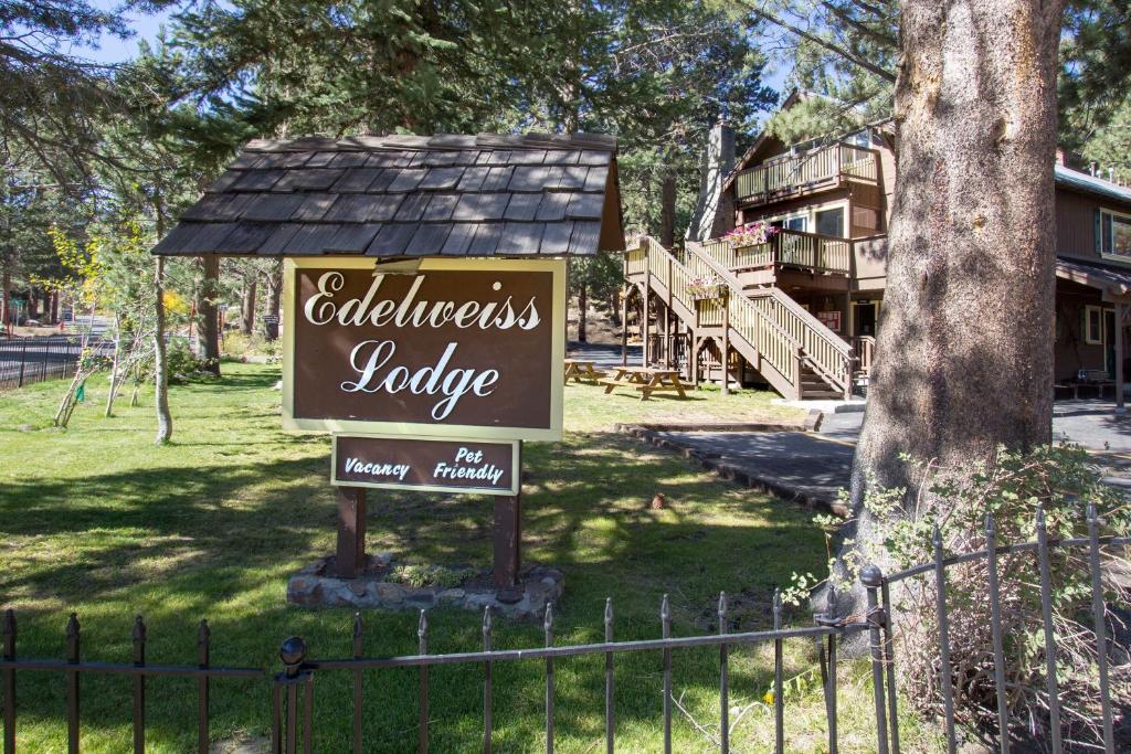 a sign in front of a house at Edelweiss Lodge in Mammoth Lakes