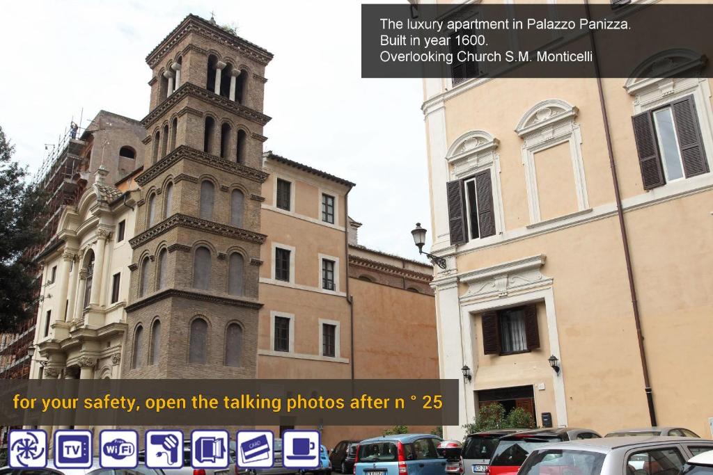 ローマにあるApartment Monticelliの駐車場横の高塔のある建物