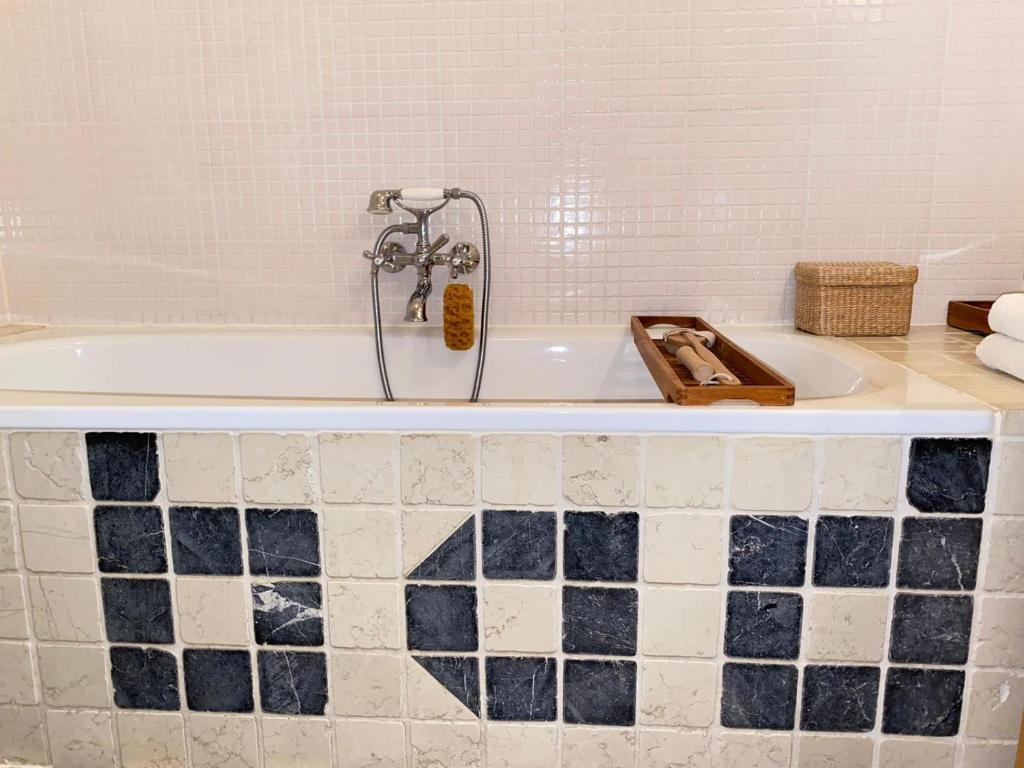 Een badkamer bij Hotel het Oude Postkantoor