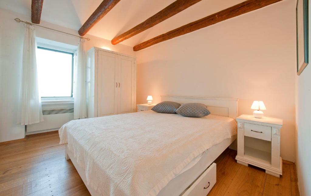 Postel nebo postele na pokoji v ubytování Villa Tangerine Vis