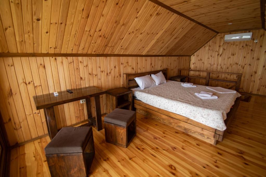 Ένα ή περισσότερα κρεβάτια σε δωμάτιο στο Спортохота