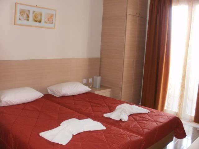 Postel nebo postele na pokoji v ubytování Amfitrion Hotel