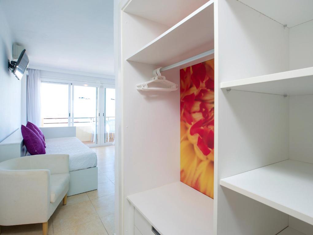 Postel nebo postele na pokoji v ubytování Hostal Costa Blanca