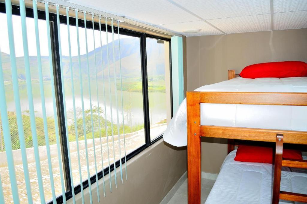 Postel nebo postele na pokoji v ubytování El Balcon de los Reyes