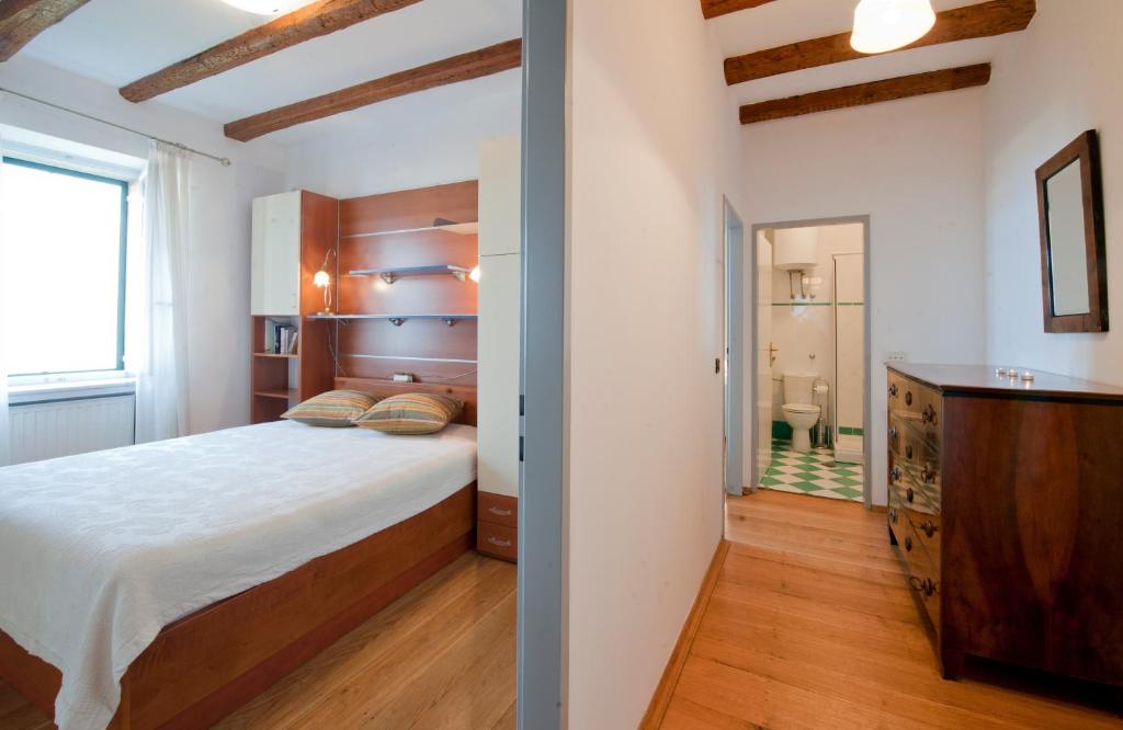 Postel nebo postele na pokoji v ubytování Villa Tangerine Vis