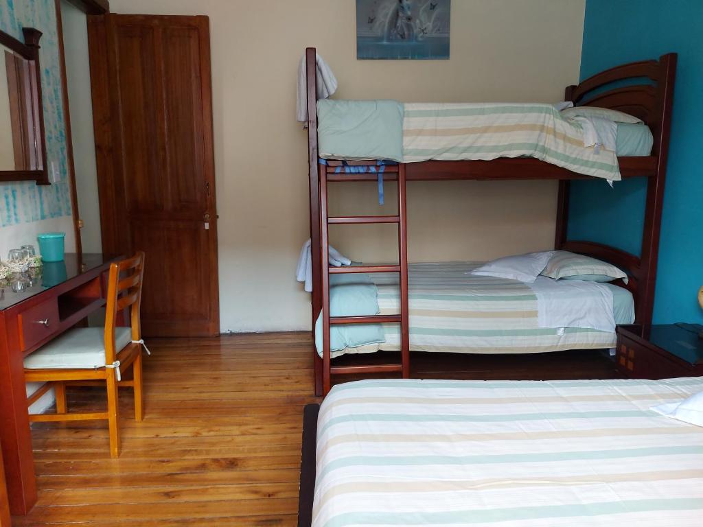Postel nebo postele na pokoji v ubytování Posada Tambuca