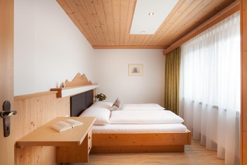 Postel nebo postele na pokoji v ubytování Haus Bstieler