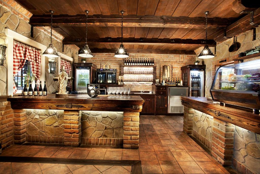 Lounge nebo bar v ubytování Vinařství U Kapličky