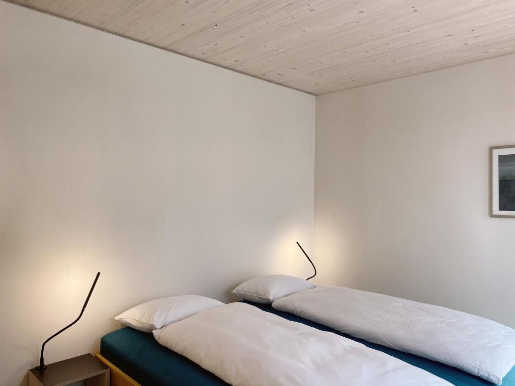 Postel nebo postele na pokoji v ubytování Gästehaus am Lagerplatz