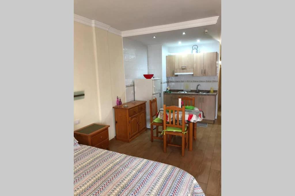A kitchen or kitchenette at Plaza Charco - Top centro - Piscina Rooftop