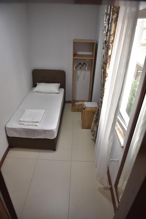 Postel nebo postele na pokoji v ubytování Yeşilyurt otel