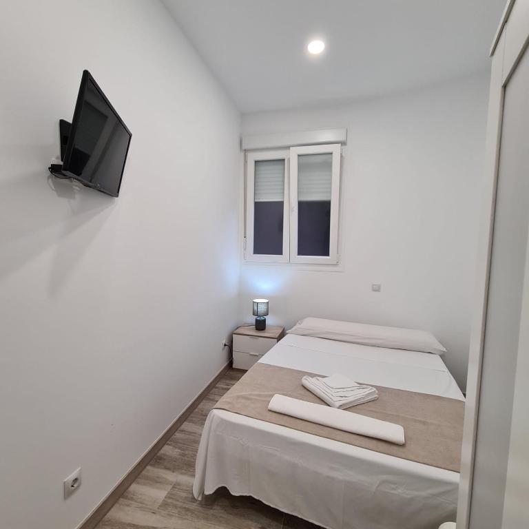 Posteľ alebo postele v izbe v ubytovaní Hostal Las Fronteras