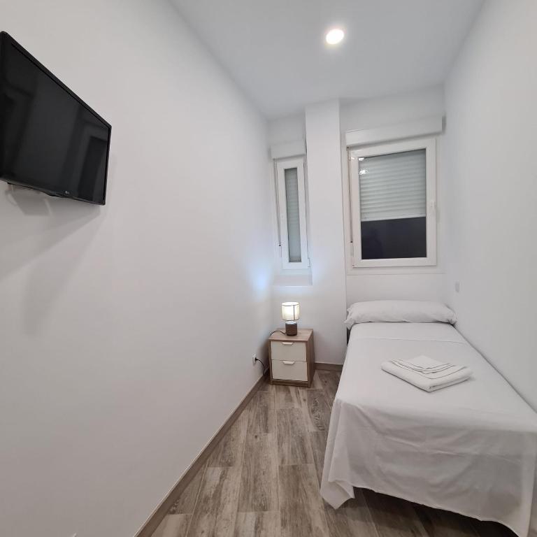Posteľ alebo postele v izbe v ubytovaní Hostal Las Fronteras