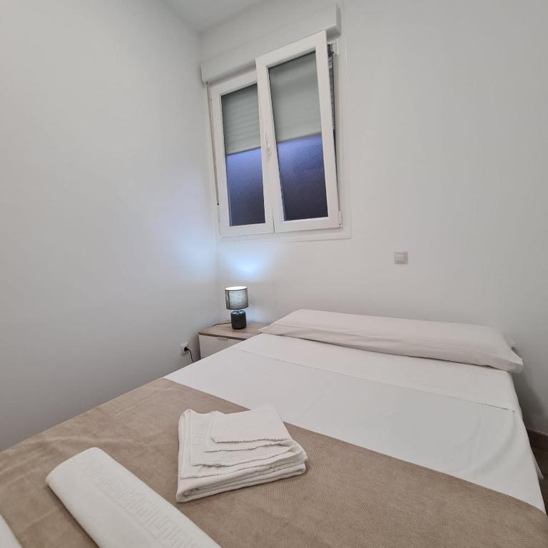 Posteľ alebo postele v izbe v ubytovaní Hostal Las Fronteras