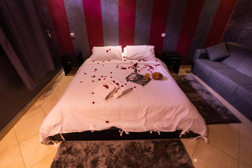 Postel nebo postele na pokoji v ubytování Hotel Toulousain