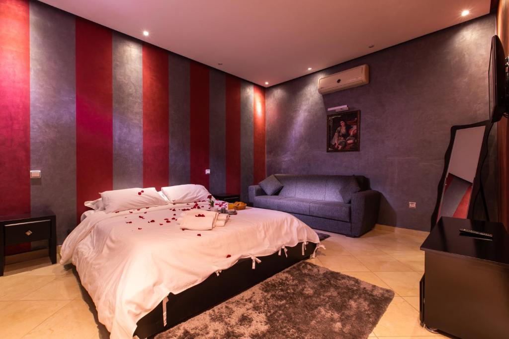 Postel nebo postele na pokoji v ubytování Hotel Toulousain