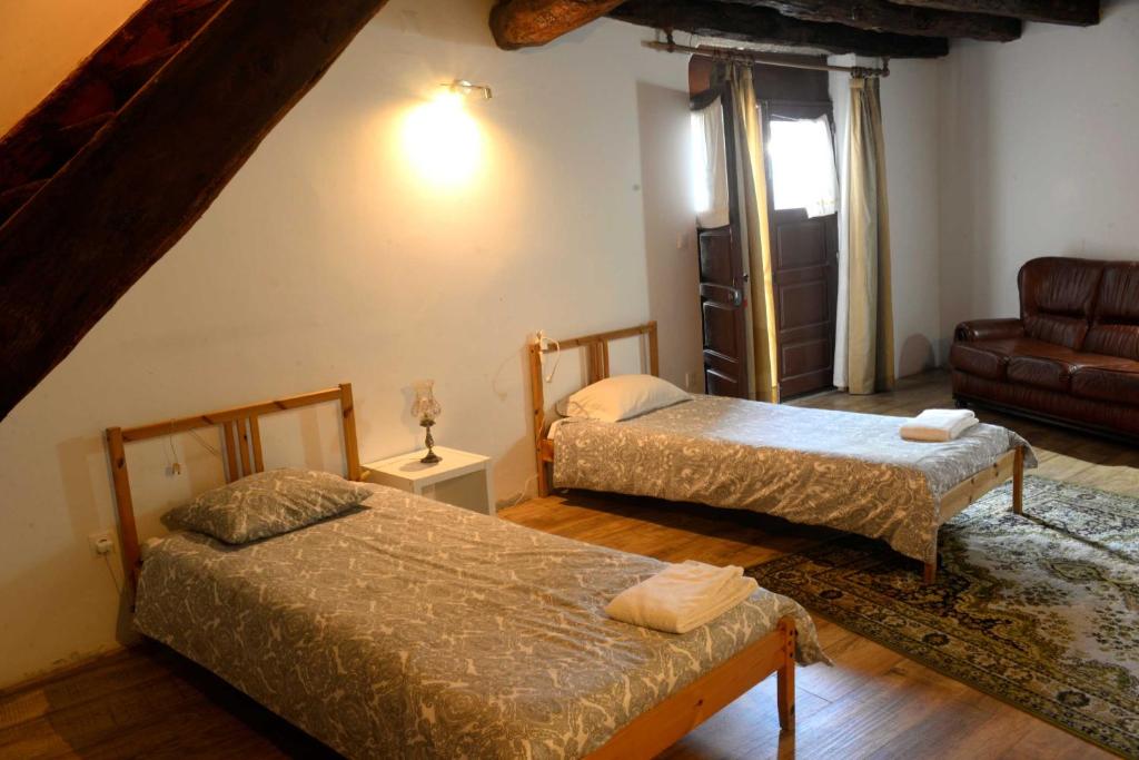 Postel nebo postele na pokoji v ubytování casa das pombas