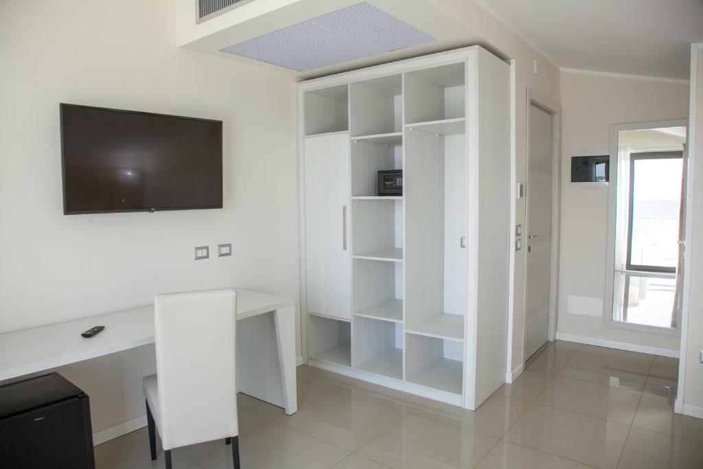 TV a/nebo společenská místnost v ubytování Hotel Dolce Stella