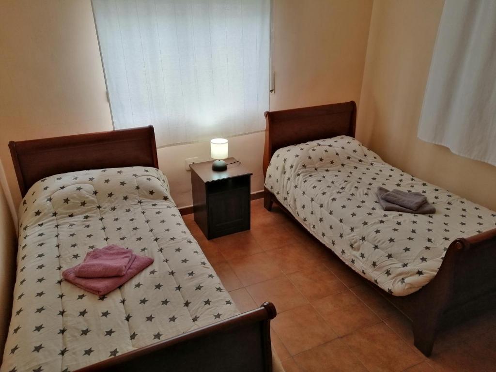 Postel nebo postele na pokoji v ubytování CHALET MONTPRATS, SERRA