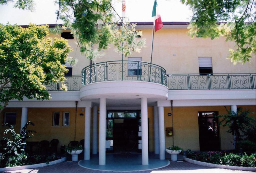 a building with a balcony on top of it at Hotel Mercede 2 in San Felice Circeo