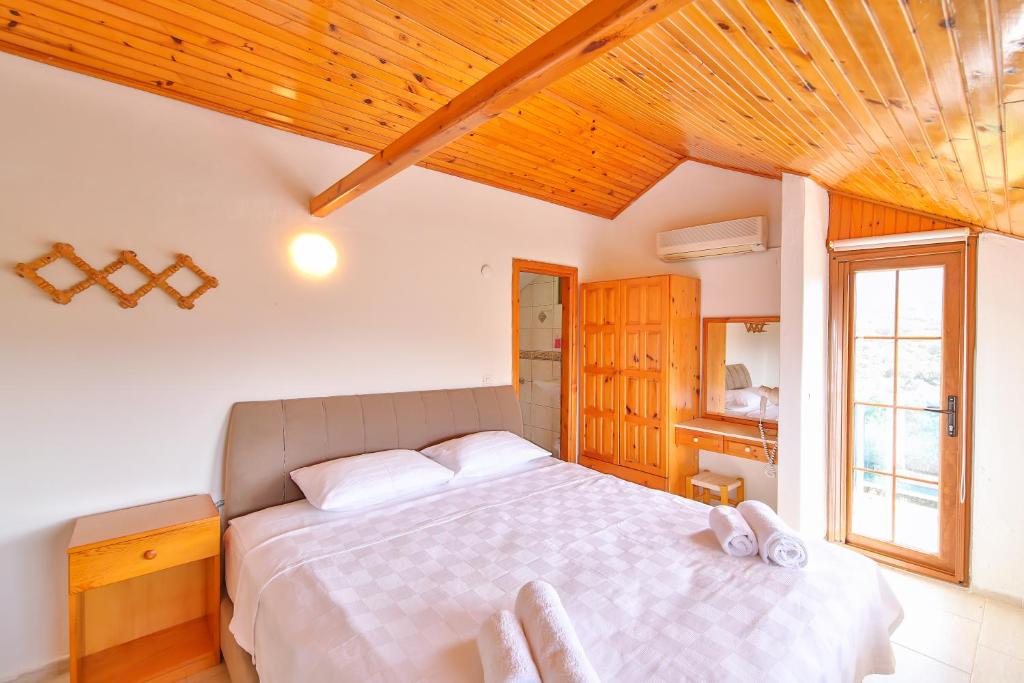 Postel nebo postele na pokoji v ubytování Villa Dundar - Kas Apartments
