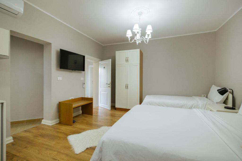 Postel nebo postele na pokoji v ubytování Vila 1