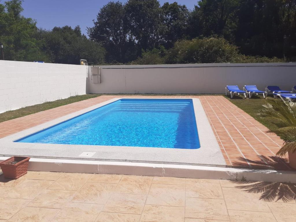 Bazén v ubytování Hotel Millan nebo v jeho okolí