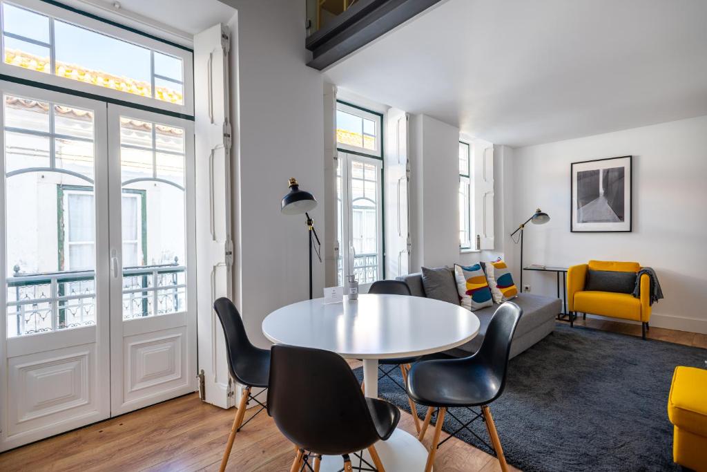 Uma área de estar em Villa Graça -Hostels and Apartments