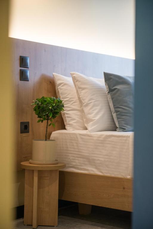 Posteľ alebo postele v izbe v ubytovaní Metis Urbane Living Spaces