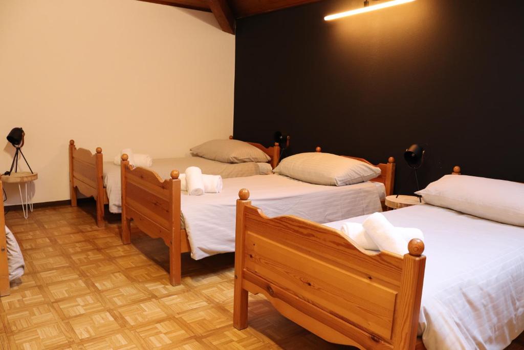 Postel nebo postele na pokoji v ubytování Borgovecchio Albergo